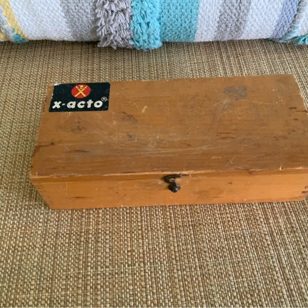 Vintage X-acto wooden box with 3 knives and miscellaneous blades.